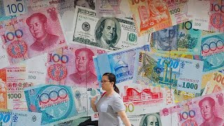فيديو: حرب الدولار واليوان الصيني تستعر