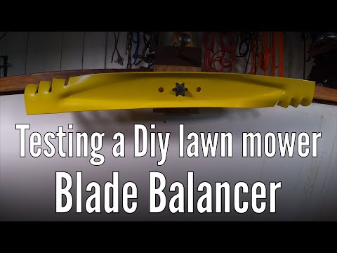 Testing a Diy lawn mower blade balancer made with scrap wood and hardware