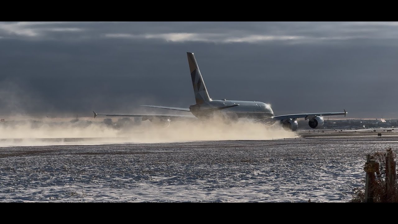 A380 Full Thrust Takeoff Blowing Snow Into the Air - YouTube
