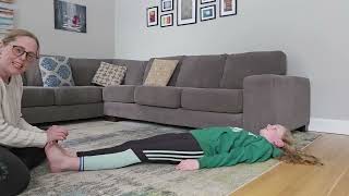 Rhythmic Movement rocking in supine. Helps to integrate primitive reflexes. Rhythmic Rocking