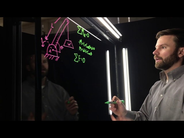 Setting up a lightboard video shoot 