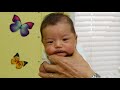 How To Calm A Crying Baby - Dr. Robert Hamilton Demonstrates The Hold (Official)