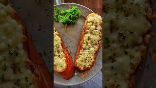 A garlic bread toast topped with cheese | Garlic Bread |