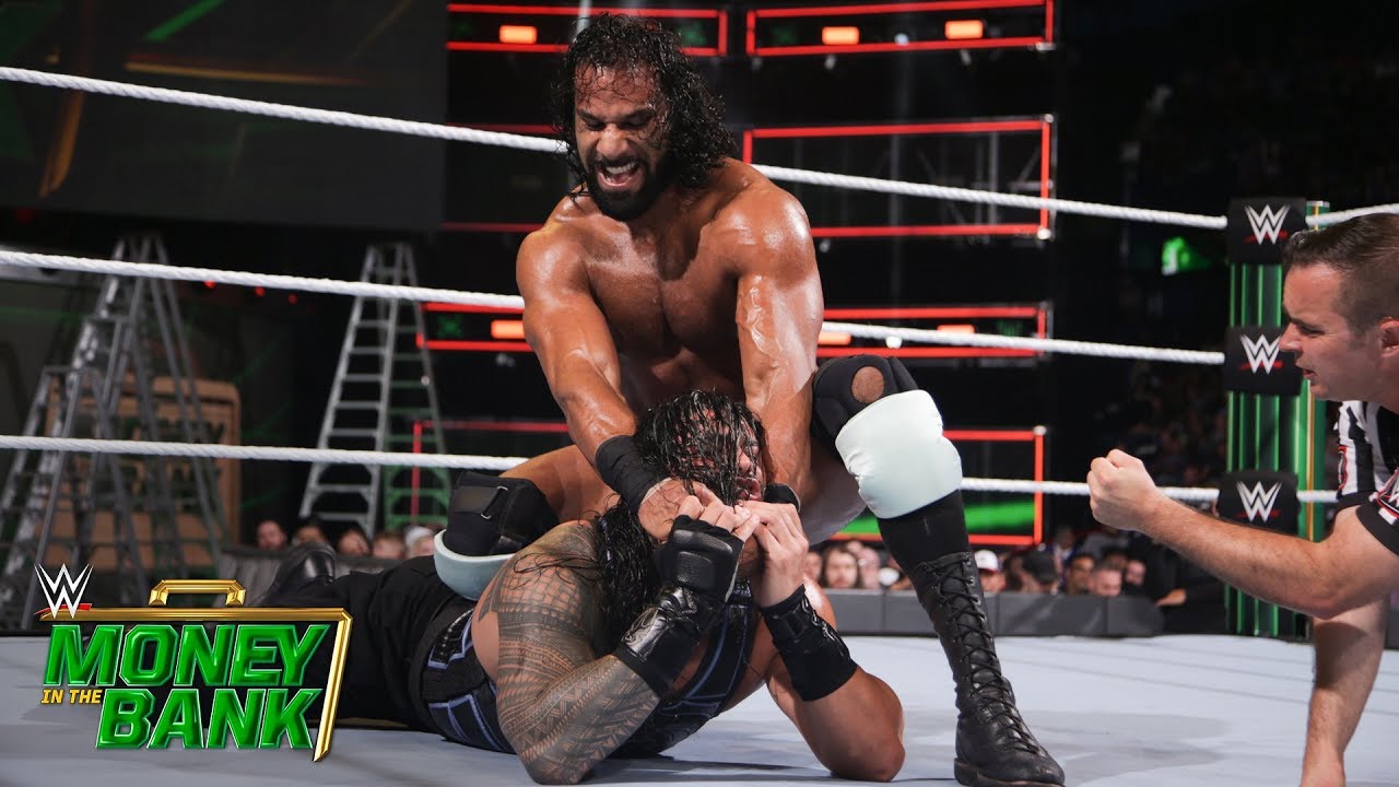 Reigns Stumbles Against Mahal Due To A Sudden Attack Money In The