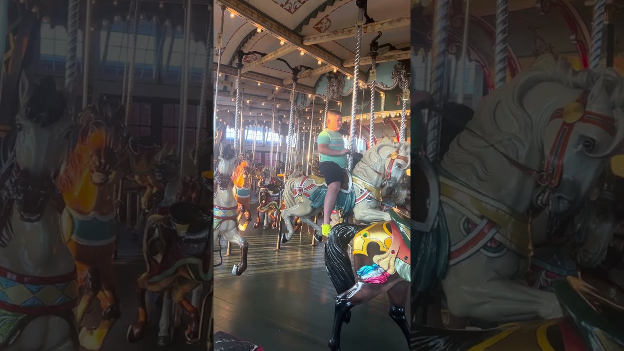 Ethan ridding in the paragon carousel