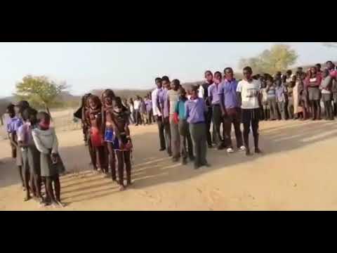 Himba school pupils sing father remember me. in Namibia.