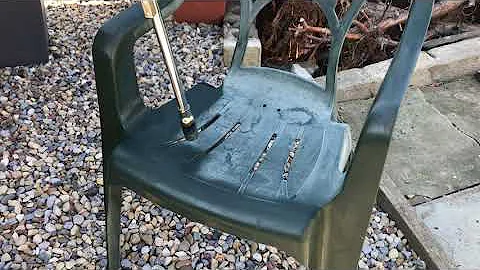 Restoring faded garden chairs with fire
