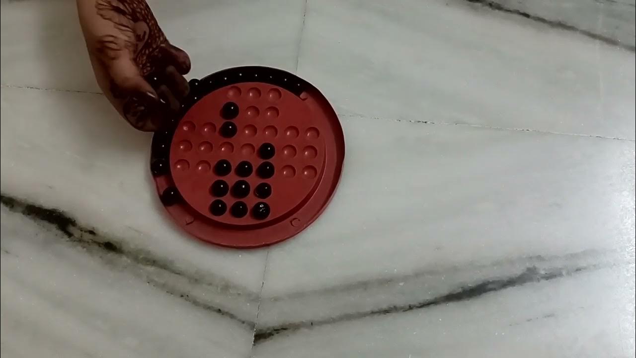 Marbles game / How to play Brainvita Marble Solitaire game YouTube