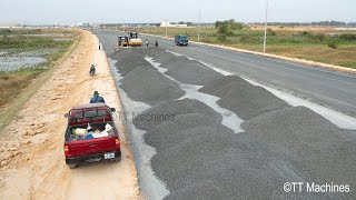 Powerful Komatsu Bulldozer Spreading Gravel And Strong Dump Trucks Dumping Gravel Building New Road