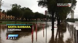 Sebuah mobil terjebak di jalan raya yang terendam banjir. sang pemilik
khawatir genangan air akan masuk ke dalam mesin mobil. ia tak sendiri,
ada puluhan mob...