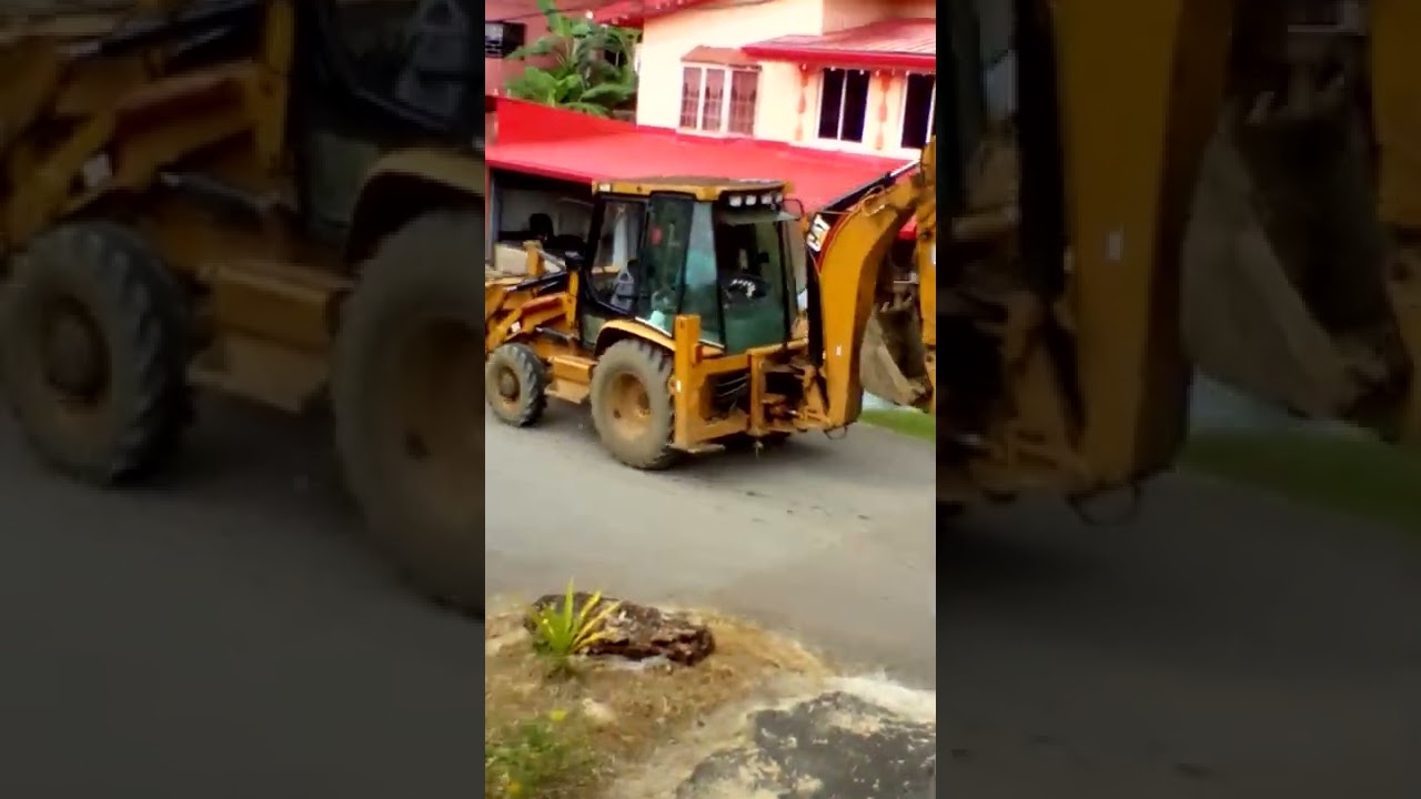 Trinidad cat backhoe YouTube