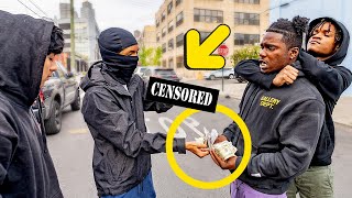 Flashing $100,000 Infront Of Thugs In The Hood Prank GONE WRONG! (MUST WATCH)