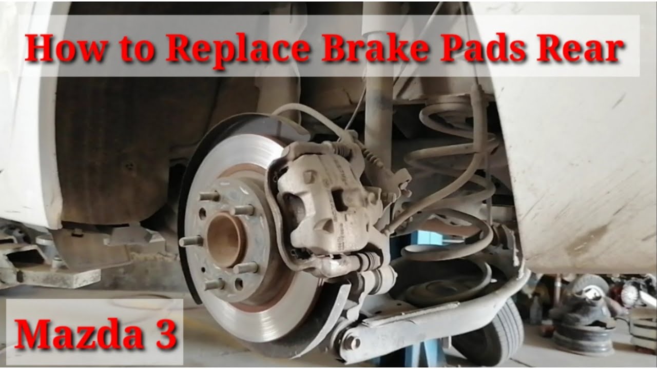 How to Replace Brake Pads Rear Mazda 3 - YouTube