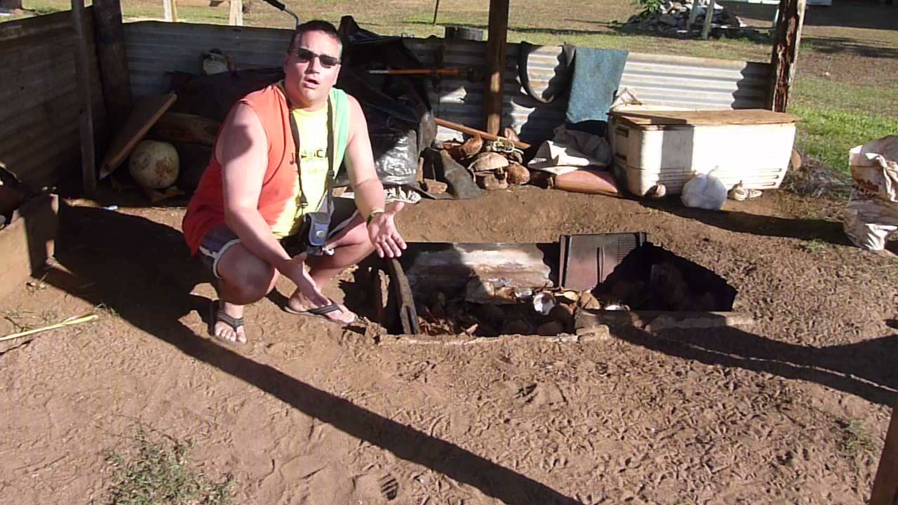 Local Family Umu - underground oven - Aitutaki, Cook Islands - YouTube