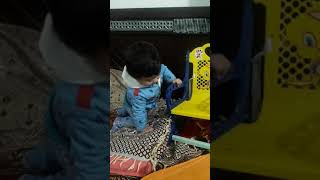 Boy Playing With His Chair And Say Chaaaa