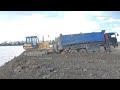 Difficult dump trucks at work | Dump Trucks unloading dirt & Bulldozers pushing dirt
