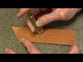 Leather craft  carving feather into wet cased leather  carving leather bruce cheaney leathercraft