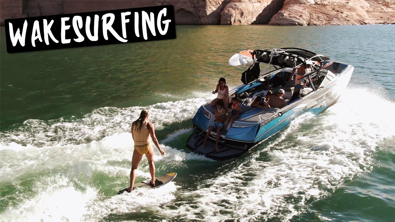 WAKESURFING IN NAVAJO CANYON LAKE POWELL BEHIND A SUPER AIR NAUTIQUE G25