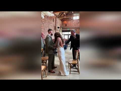 Heartwarming video shows wheelchair-bound bride incredibly walking down aisle to meet her groom