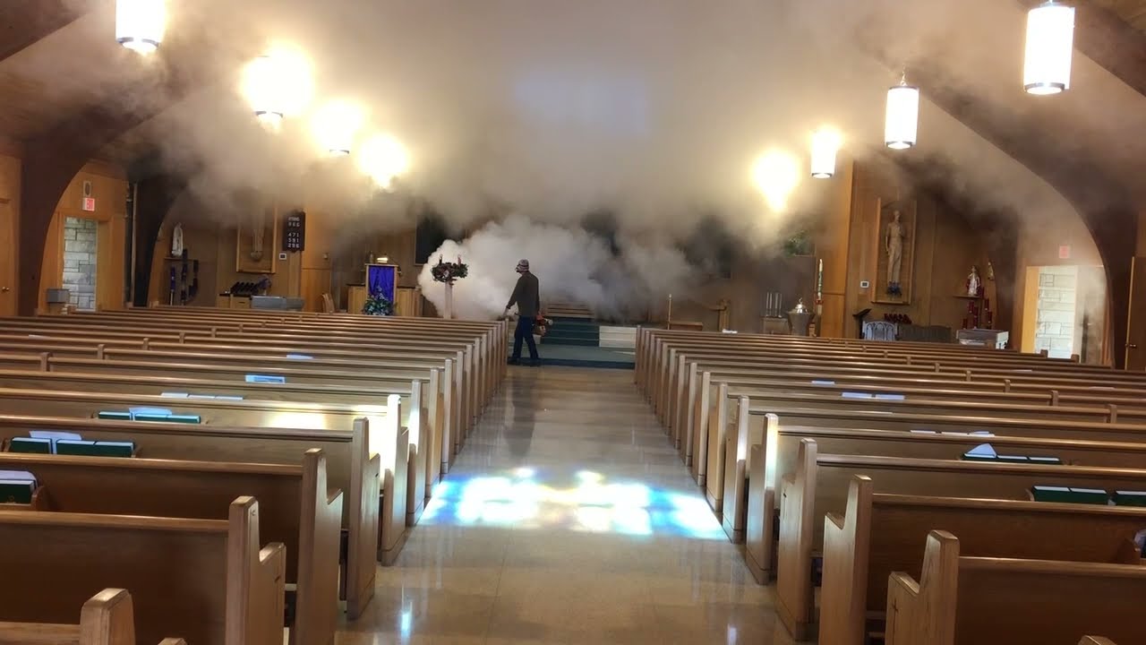 Protechs Technician using Thermal Fogging to Neutralize & Absorb Smoke Odor after a Church Fire