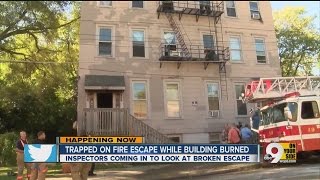 People fleeing fire get stuck on fire escape