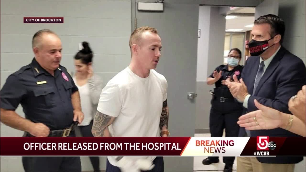Officer released from hospital after being shot in standoff - YouTube