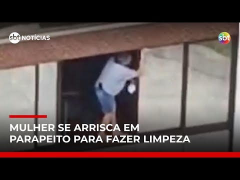 Video tudo-por-vidro-brilhando-mulher-se-arrisca-em-parapeito-para-limpar-janela-sbt-noticias