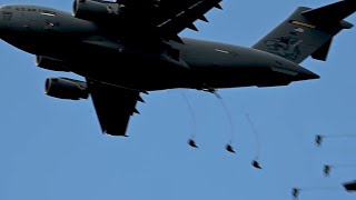 Paratroopers NATO near Ukraine rush from C 130J Giants towards the conflict area