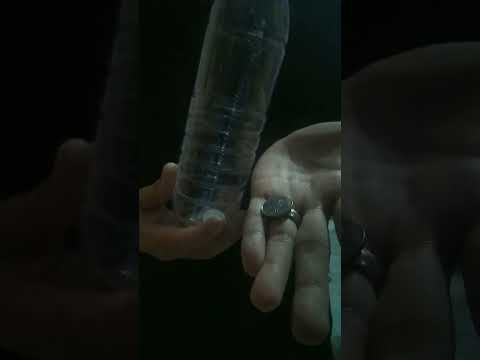 Coin Thru Bottle Magictrick Tutorial #shorts #magic #coin