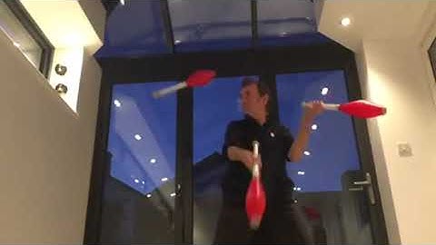 Juggling....3 clubs....chops....in slow mo!