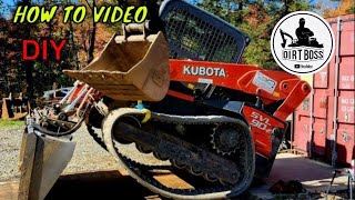 Owner operator Installing Front idlers on a skid steer