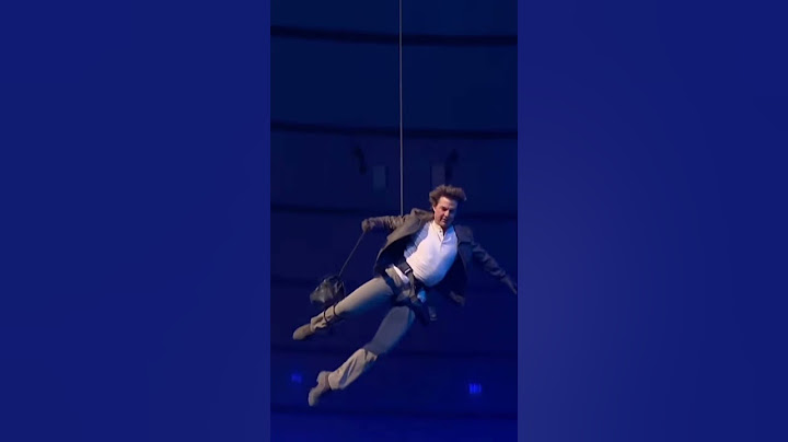 Tom Cruise Jumps Off the Stadium Roof and Skydives!
