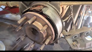 2008 - 2014 Ford Truck E-150 How to Replace Rear Brake Pads & Brake Rotor.