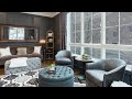 Upscale Living Room with Falling Afternoon Snow