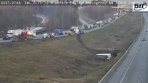Georgia: Box Truck Drives Off Interstate, Down Embarkment & Flips Over