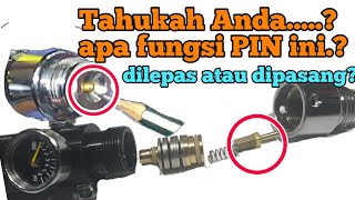 What is the function of the small pin output on the air regulator