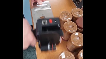 Meenjet M6 Handheld Printer Date Coding Peanut Butter Jars