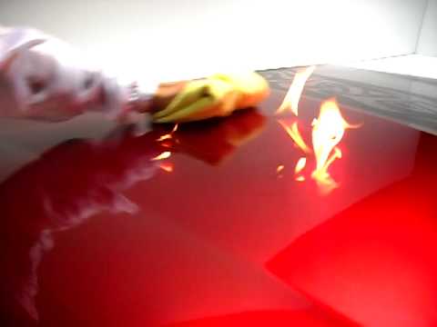 Flames test on hood wrapped with FLX-Paint. FLX-Paint paint film is flexible & stretchable; can wrap any car for a painted finish that applies like a car wrap. Made with automotive urethane paint, It is remarkably durable & can be removed years later; factory paint is perfectly protected