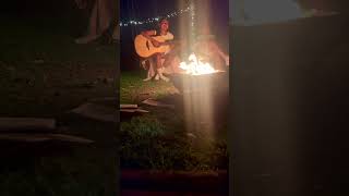 Cozy bonfire vibes with guitar tunes under fairy lights 🌟🔥 #campfiremusic #cozynightin