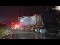 Semi truck crashes in the rain on the 5 freeway in Newhall, California.