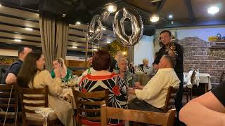 A Band Playing In A Restaurant In Skopje, North Macedonia