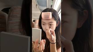 Doing Makeup On The Train