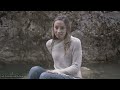 Wetlook - Elaine in river under the rain (Adidas, jeans and sweater)