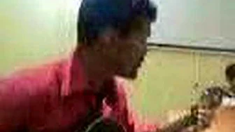 Al-Ekhwa Band singer Ali Bahar Singing with his Own guitar Al-Ekhwa Band singer Ali Bahar Singing with his Own guitar