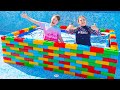 Adriana and Ali How to Swim in the Kids Pool and Plays with Fun Water Toys