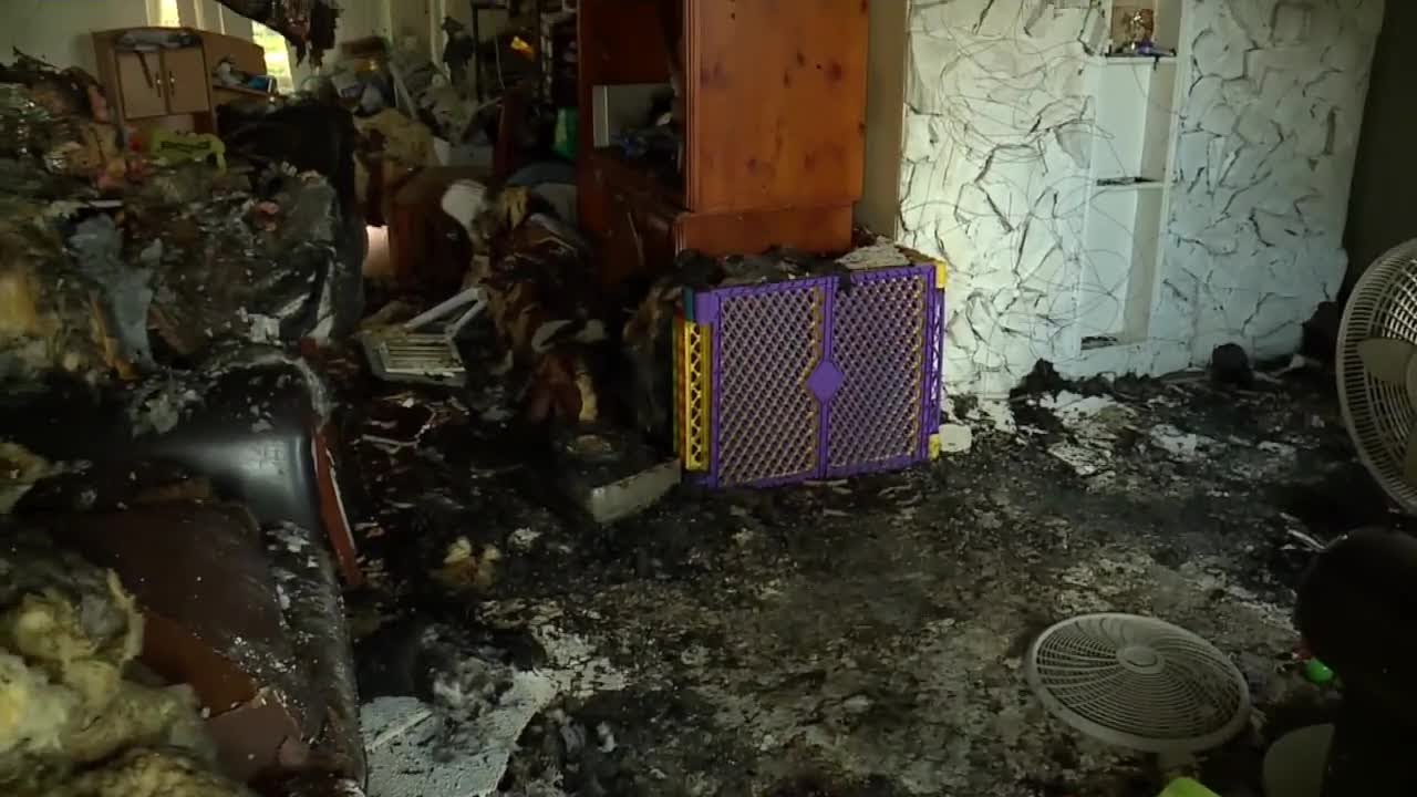 House fire displaces 7-member family in Boynton Beach - YouTube