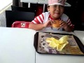 Adeline eating burger mcdonalds