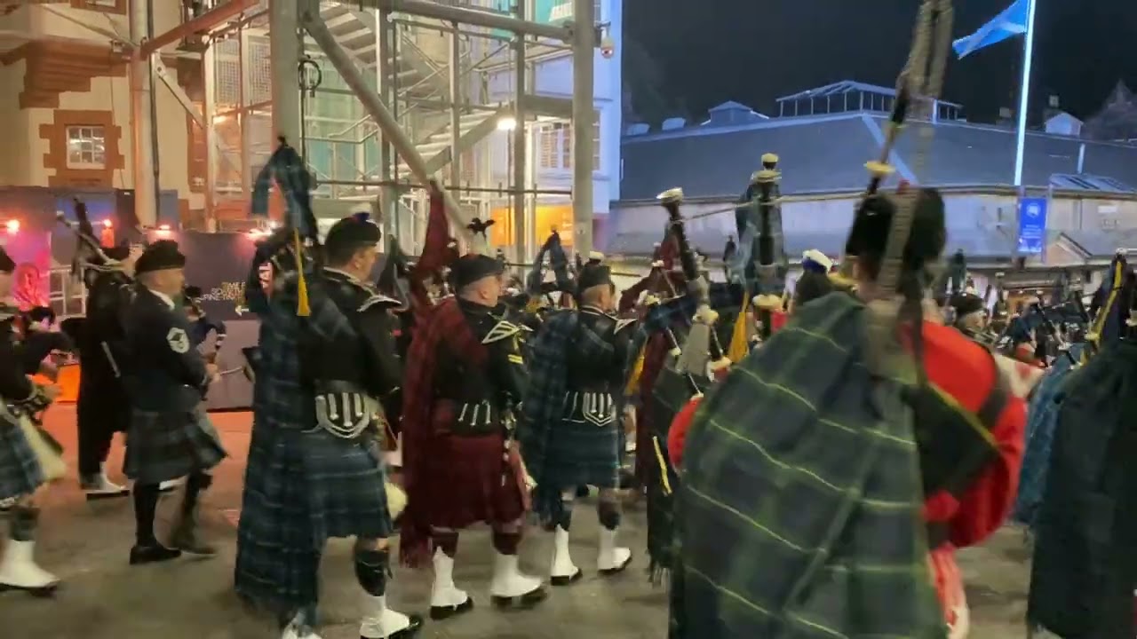 Pipes & Drums Marching Out merging at the top of Castle Hill — Royal Edinburgh Military Tattoo 2023