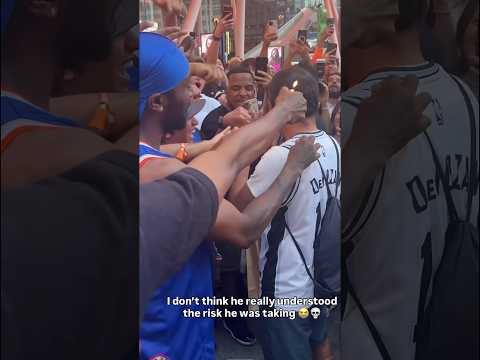 Video KNICKS FANS TRY TO SET SPURS FAN ON FIRE