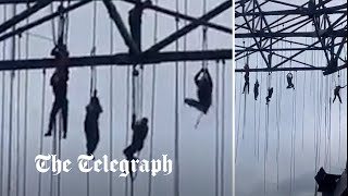 video: Watch: Workers left hanging 500ft in air after scaffolding collapses